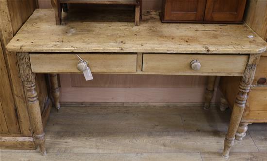 A 19th century pine table, with two drawers W.122cm